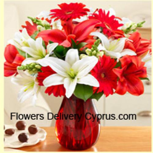 Lovely Assorted Flowers in Glass Vase